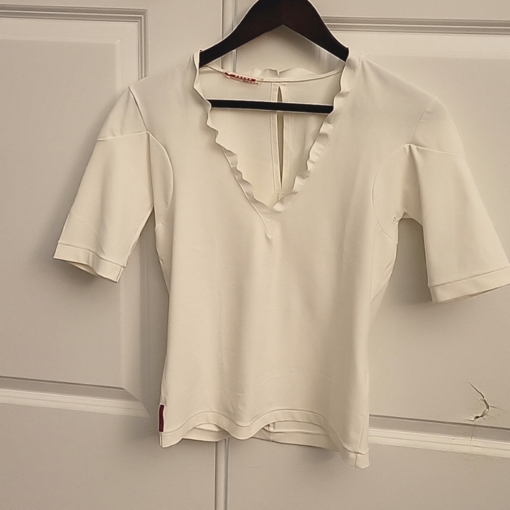 White Prada Tee in Size Small. Made in Italy. Gently worn.